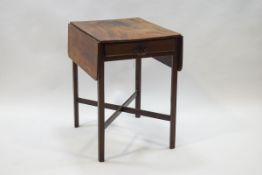 A 19th century mahogany Pembroke table with single drawer on cross-stretchered square legs,