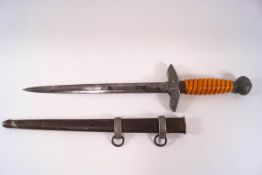 A WWII dress dagger and sheath,