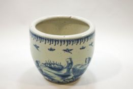 A large Chinese fish bowl painted in underglaze blue with figures in a river landscape,