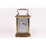 A 20th century brass carriage clock with Swiss movement, retailed by Matthew Norman, London,