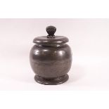 A Liberty & Co "Tudric" pewter biscuit barrel and lid,