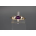 An 18 carat white gold amethyst and diamond three stone ring. Hallmarked 18ct, London, 2007. 3.