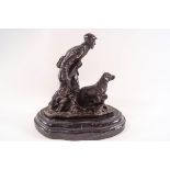 After Mene, bronze of a hunter with his dog on slate base, 19.