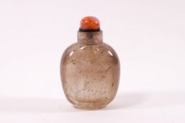 An early 20th century Chinese hair crystal snuff bottle with hardstone stopper, 7.