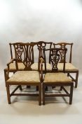 A harlequin set of five George III mahogany chairs,