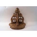 A 19th century Continental carved wood wall bracket,