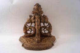 A 19th century Continental carved wood wall bracket,
