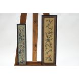 A 20th century Chinese embroidered silk panel of exotic birds within branches, 58cm x 15.