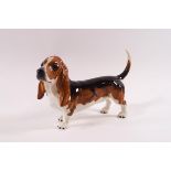 A Beswick model of a Bloodhound, printed factory mark, 13cm high,