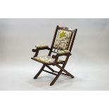 A Victorian mahogany Campaign chair,