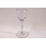 An 18th century drinking glass, the conical bowl on a double spiral twist stem with single knop,