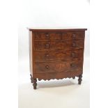 A Victorian mahogany bow fronted chest of two short and three long drawers,