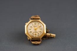 A yellow gold Accurist wristwatch. Round champagne figure dial with additional second hand dial.