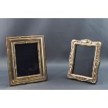 A silver photograph frame with reeded and ribbon borders, overall 13cm x 10.