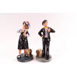 A pair of Royal Doulton figures: Pearly Boy HN2767 and Pearly Girl HN2769,