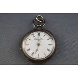 A Swiss silver cased open face fob watch with a key wind cylinder movement,