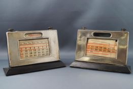 Two silver engine turned mounted desk calendars, both with associated incomplete date cards,