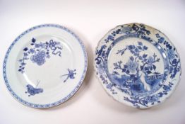 An 18th century Chinese porcelain shaped plate with blue and white flowering branch decoration, 22.