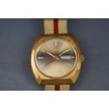 Nappey, automatic, a 1970's gold-plated tonneau-shaped wrist watch,