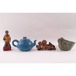 A Chinese earthenware blue glaze teapot, a hardstone carving of two dragons,