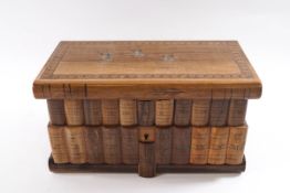 A Sorrento olivewood jewellery box in the form of a row of books,