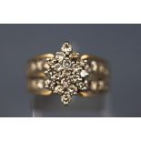 A yellow and white gold cluster ring, set with thirty four round brilliant diamonds,