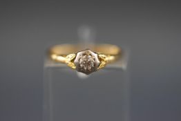 An early 20th century gold and diamond solitaire ring, the old-cut stone approx. 0.