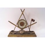 An early 20th century brass golfing mantel clock,