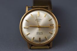 A Gentleman's wristwatch by Rotary. Round silver dial with baton markings and date feature.