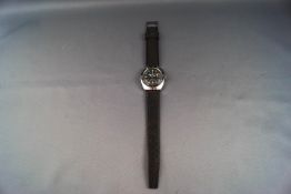 Mortimer, Superdatomatic, a vintage stainless tonneau-shaped wrist watch,