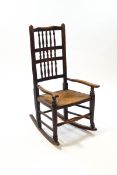 A 19th century Lancashire alder or ash spindleback rocking chair, circa 1870,