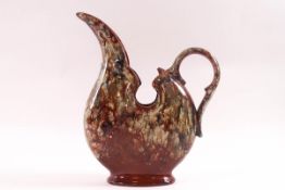A Watcombe pottery jug in the manner of Christopher Dresser,