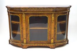 A Victorian inlaid burr walnut breakfront credenza with gilt metal Classical motif mounts,