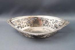 A silver sweet meat dish, with cast gadrooned rim, and pierced sides, Birmingham 1901, 18cm wide, 3.