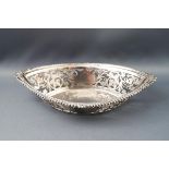 A silver sweet meat dish, with cast gadrooned rim, and pierced sides, Birmingham 1901, 18cm wide, 3.