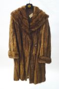 A Canadian musquash fur coat, labelled for Webb furs,