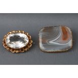 Two yellow gold mounted brooches consisting of a single banded agate with yellow mount and a single