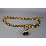 A yellow metal graduated albert chain with Tbar.