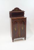 An Edwardian mahogany chiffonier of small proportions, painted Adams style decoration and stringing,
