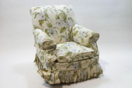 A Victorian style armchair on turned bun feet, 82cm wide Formerly at Dinder House,