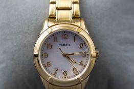 A ladies wristwatch by Timex,