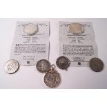 Three silver US dollars and further dollars