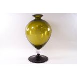 A Veronese green glass balloon shaped vase in the manner of Vernini,