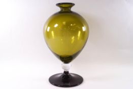 A Veronese green glass balloon shaped vase in the manner of Vernini,