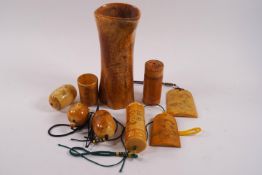 A collection of Oriental carved and engraved bone items,