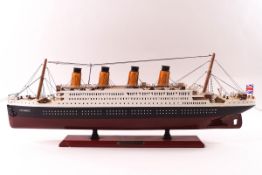 A model of the passenger liner Titanic, on stand,