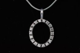 A modern white gold oval pendant set with eighteen round brilliant diamonds,