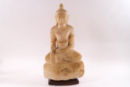 A carved hardstone figure of a Thai Buddha, possibly 17th century, 29cm high,