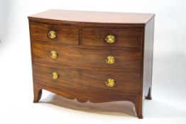 A George III mahogany bow fronted chest of two short and two long drawers,