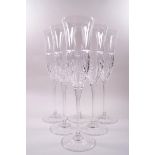 A set of six Waterford cut glass champagne flutes,